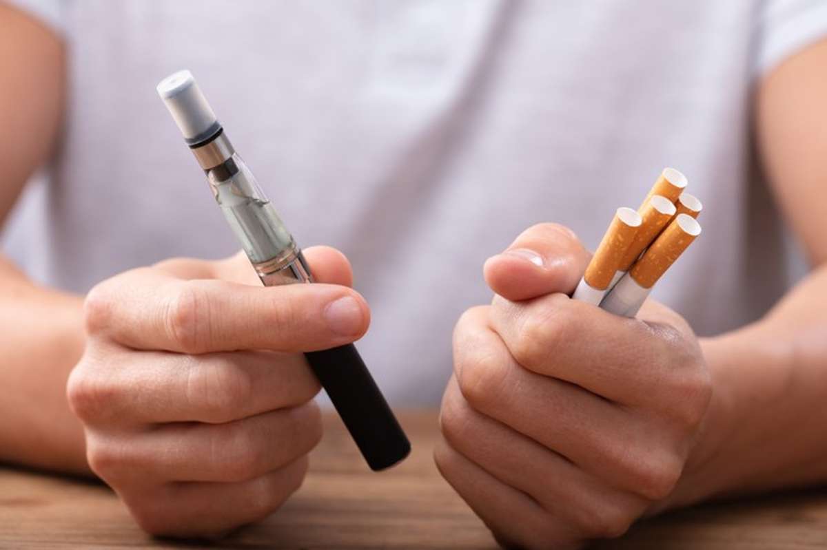 a cigarette and a vape