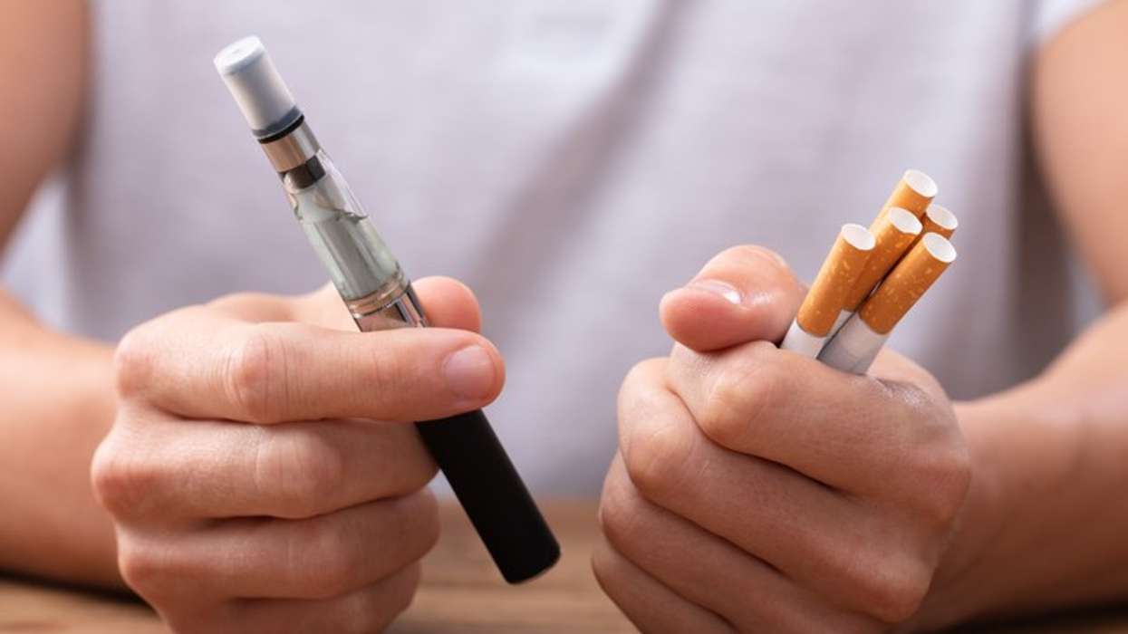 a cigarette and a vape