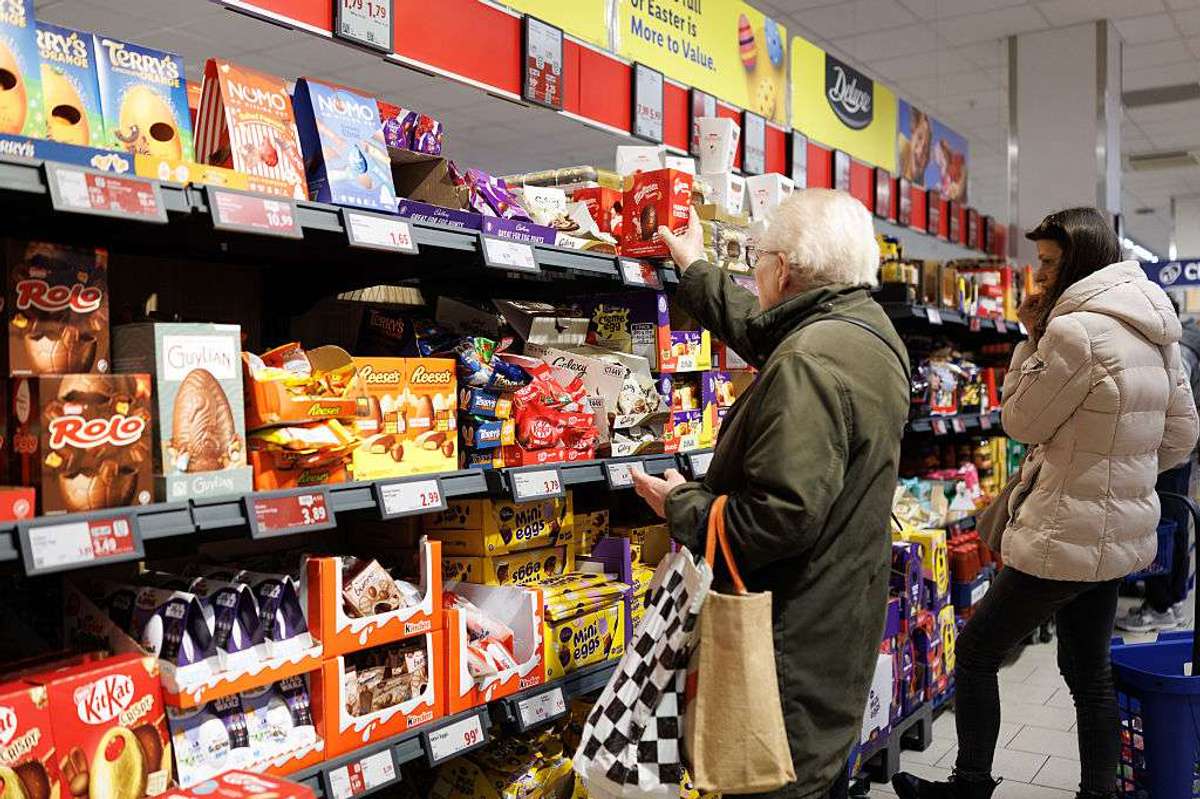 A customer chooses an Easter Egg