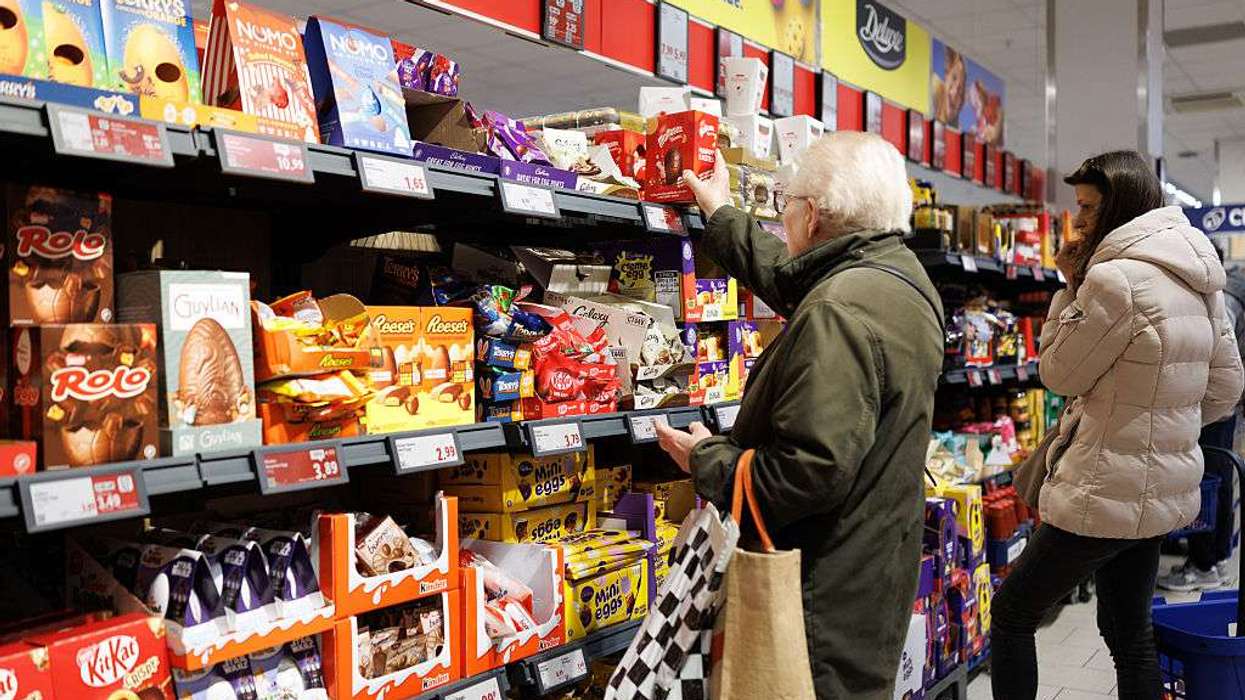 A customer chooses an Easter Egg