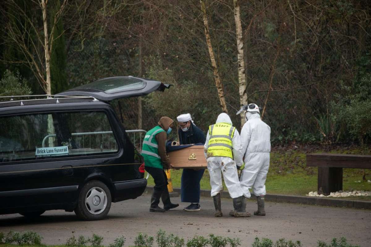'Deeply sorry': Johnson takes 'full responsibility' as Covid deaths pass 100,000