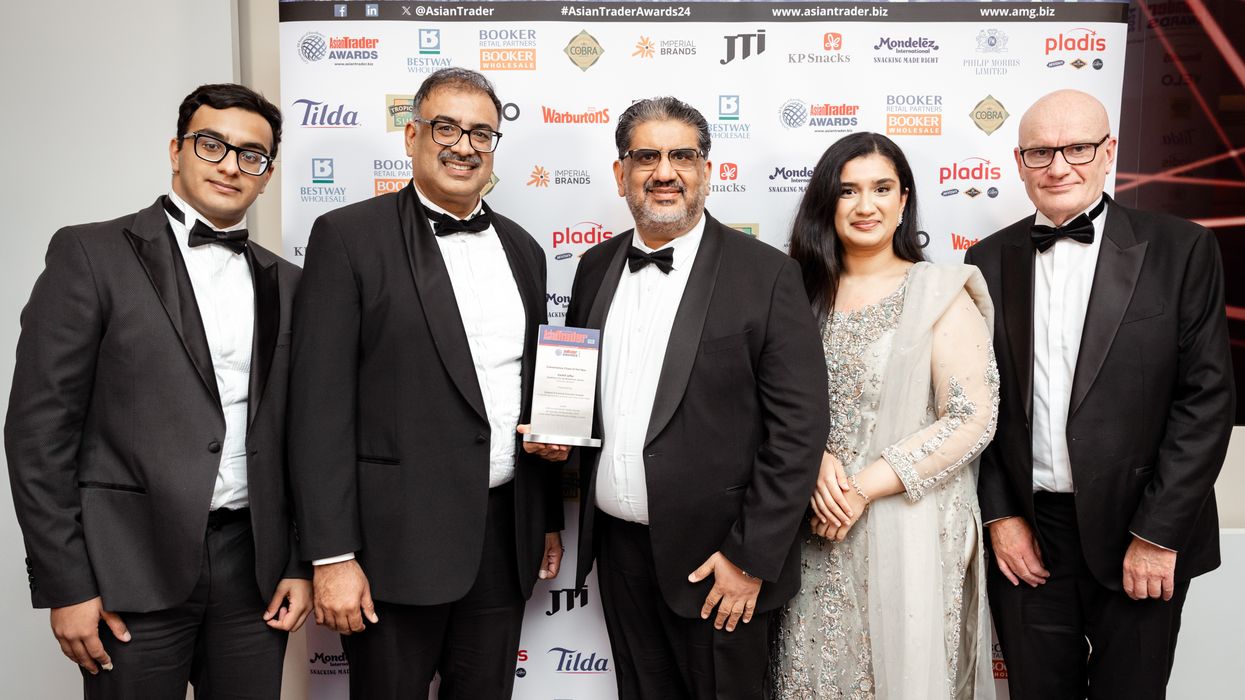 Abu, Saquib, Kash and Iman Jaffer with Asian Trader Awards trophy