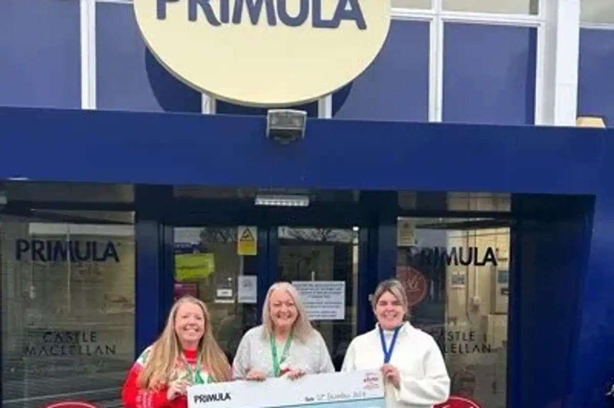 Alan Shearer residential home manager Sarah Croft and disability lead Jackie Dunn received the cheque at the Primula factory in Gateshead
