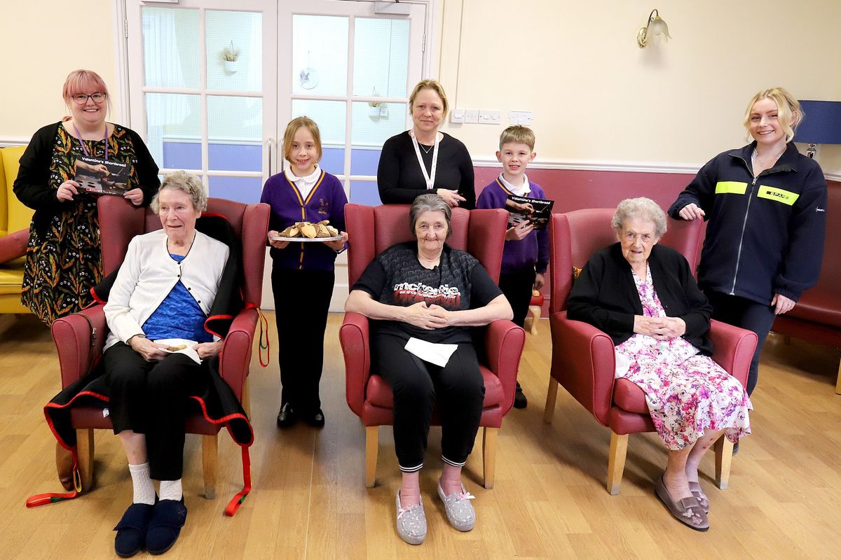 Ashton Primary students bake Valentine’s shortbread for residents.