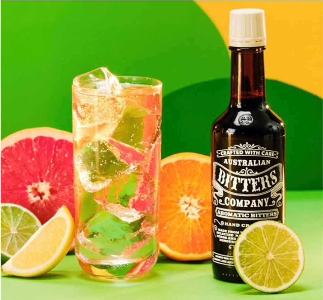 Australian Bitters Company Aromatic Bitters bottle and Lemon Lime and Bitters cocktail
