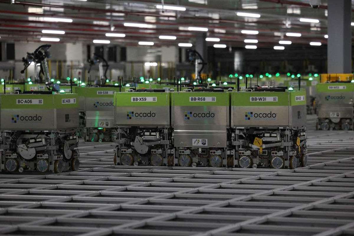 Automated packing robots at an Ocado distribution centre