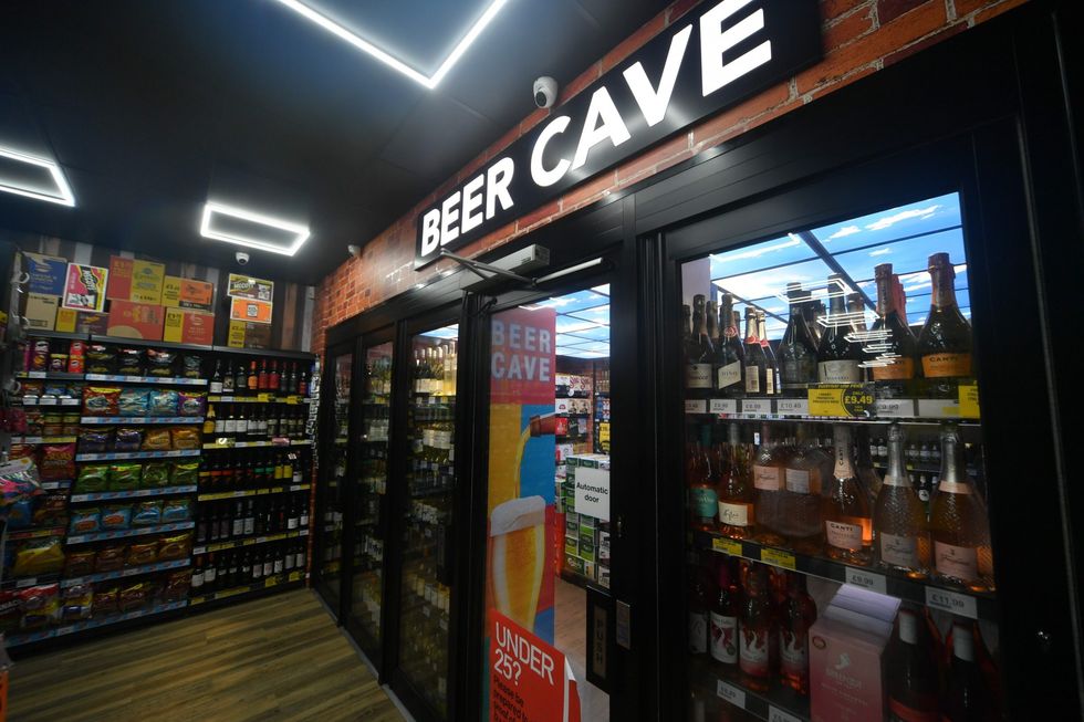 Beer Cave with blue sky panels and double-sided chillers at Premier Rassau Stores, driving sales in Ebbw Vale