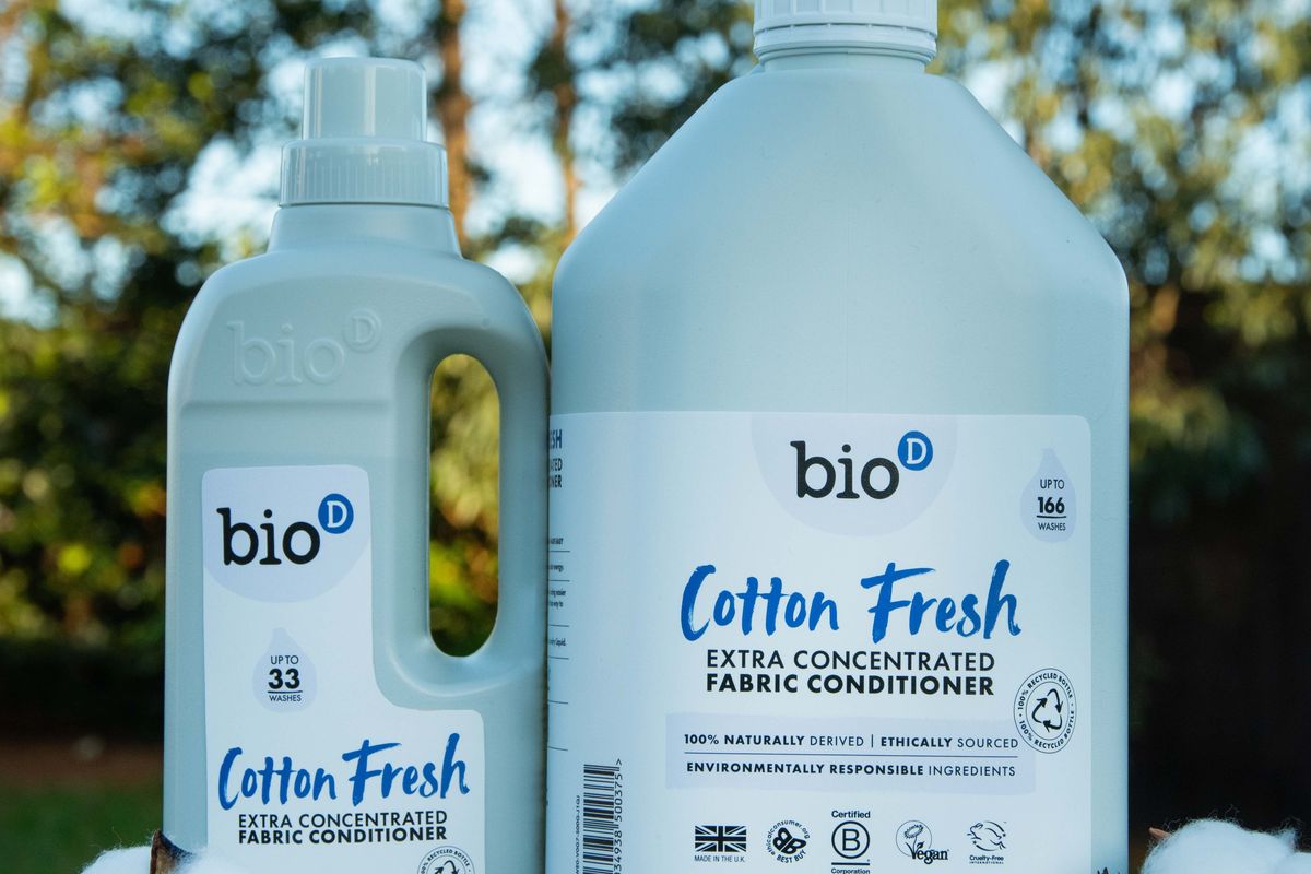 Bio-D Cotton Fresh fabric conditioner bottles with cotton, promoting eco-friendly cleaning