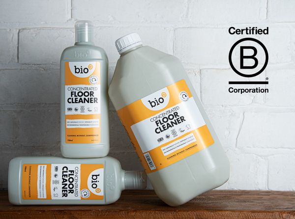 Bio-D team celebrates B Corp recertification with increased impact score and sustainability achievements