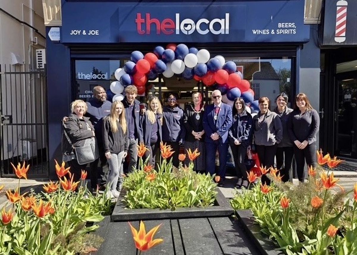 Bisi and Mayo Osundeko with team and local leaders at The Local store launch in Rainford.