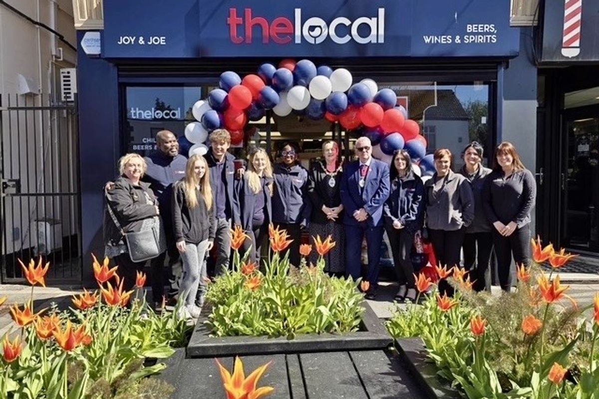 Bisi and Mayo Osundeko with team and local leaders at The Local store launch in Rainford.