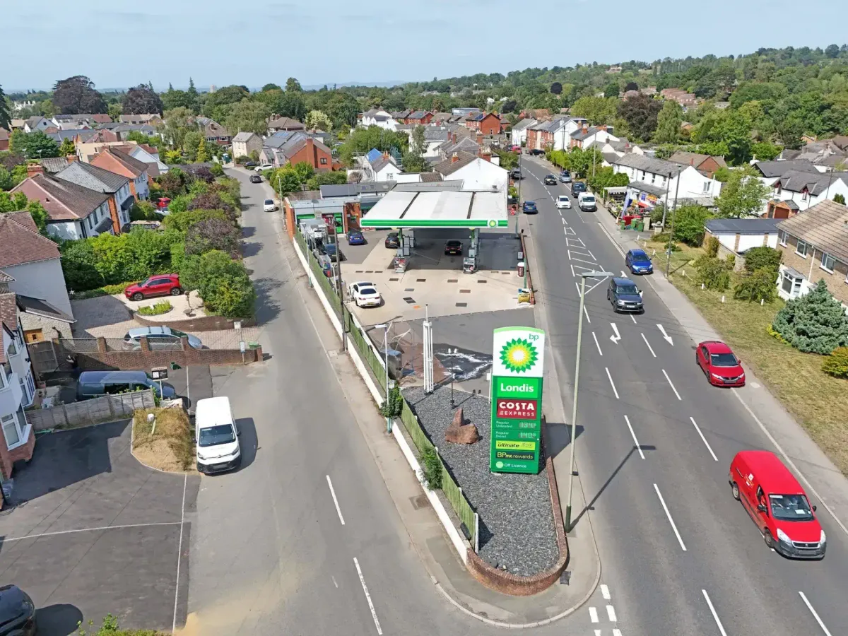 BP branded petrol filling station with Londis branded convenience store in Cheltenham