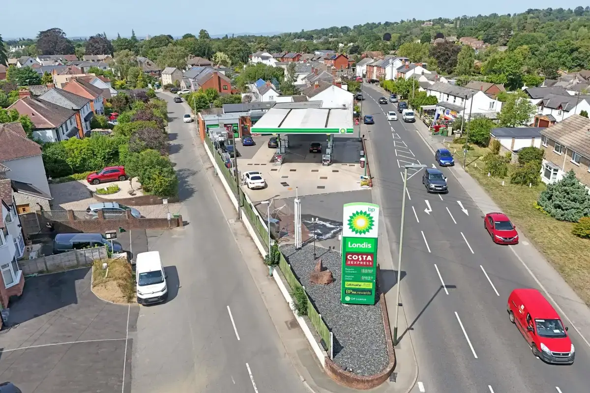 BP branded petrol filling station with Londis branded convenience store in Cheltenham