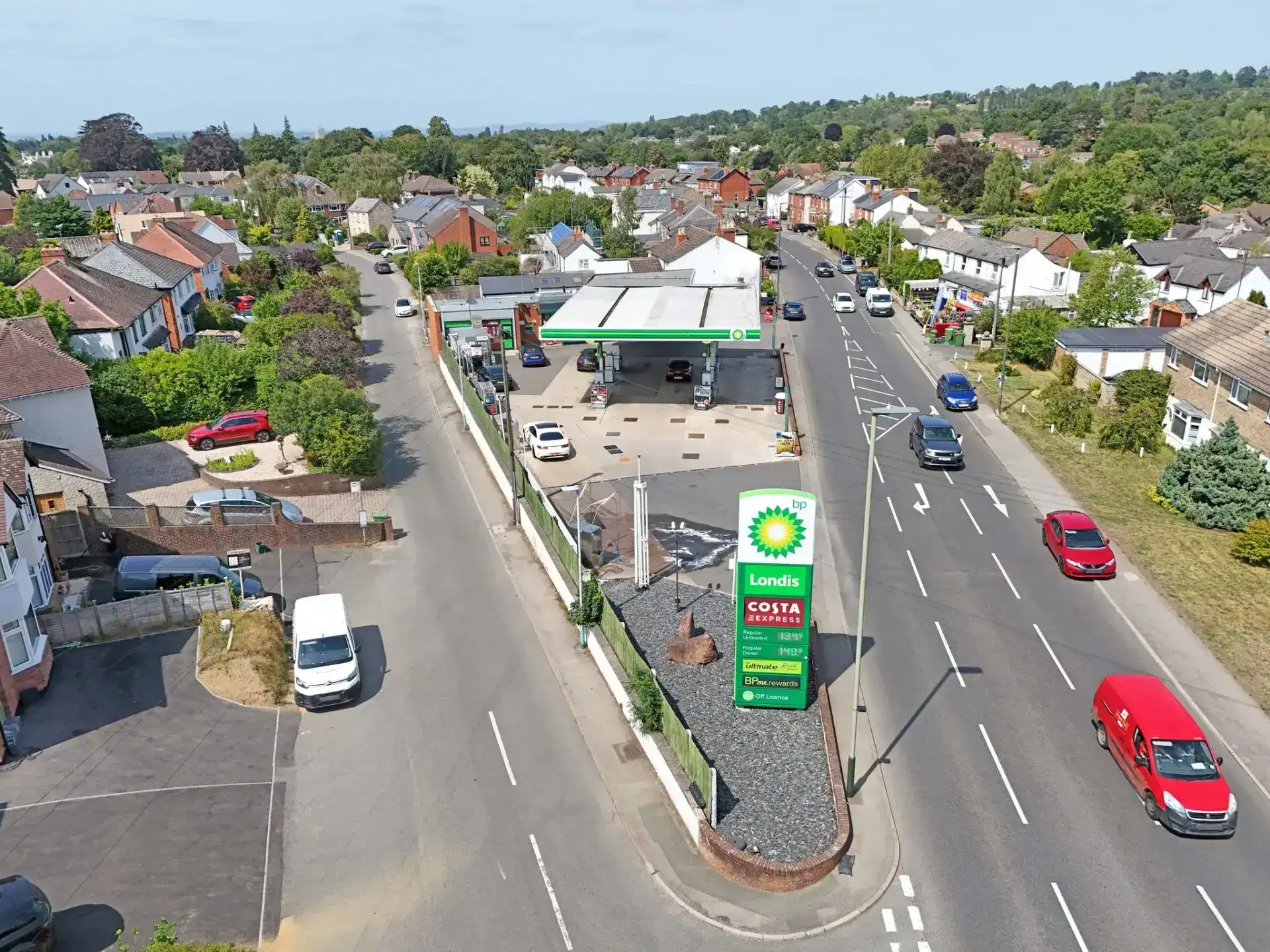 BP branded petrol filling station with Londis branded convenience store in Cheltenham