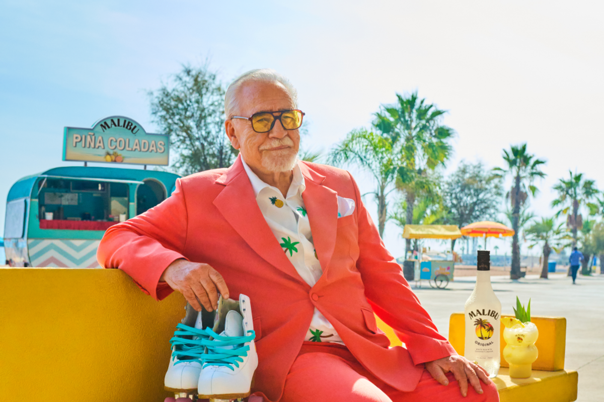 Brian Cox rolls through summer in Malibu’s Clock Off campaign ad wearing a pink suit and skates