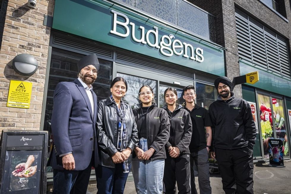 Budgens store hosting community activities like yoga and tutoring