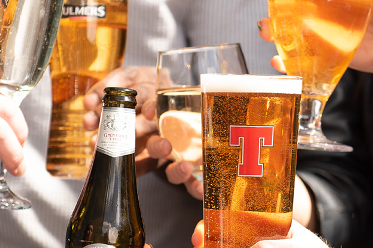C&C Group CEO Roger White reviews 2025 financials with Tennent’s and Bulmers cans, highlighting earnings growth amid challenges.