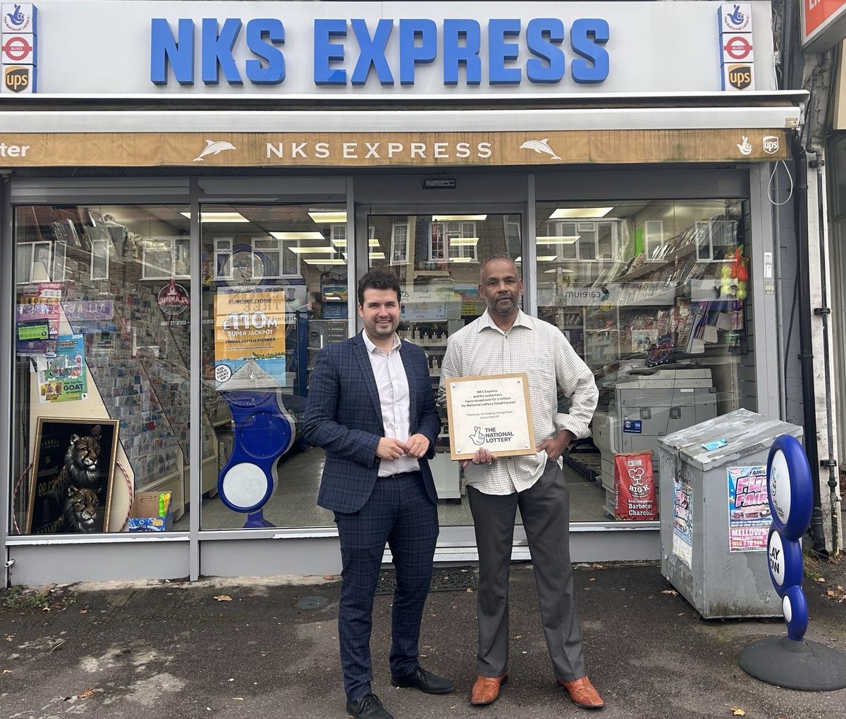 MP Elliot Colburn applauds local retailer for raising huge sum for National Lottery Good Causes
