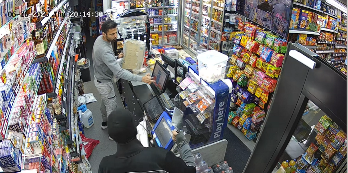 CCTV still of suspect robbing Premier Lower Bathville store in West Lothian