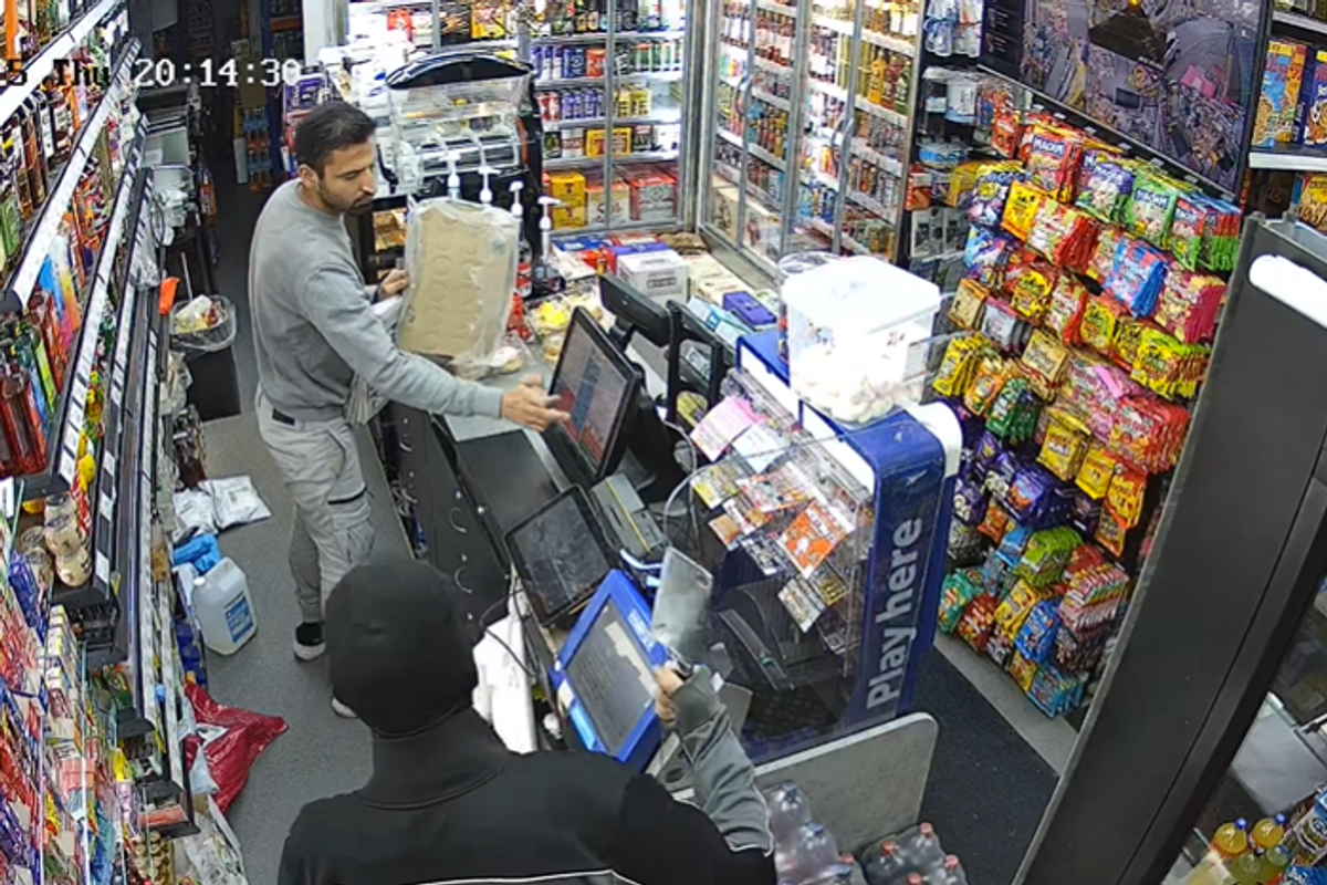 CCTV still of suspect robbing Premier Lower Bathville store in West Lothian