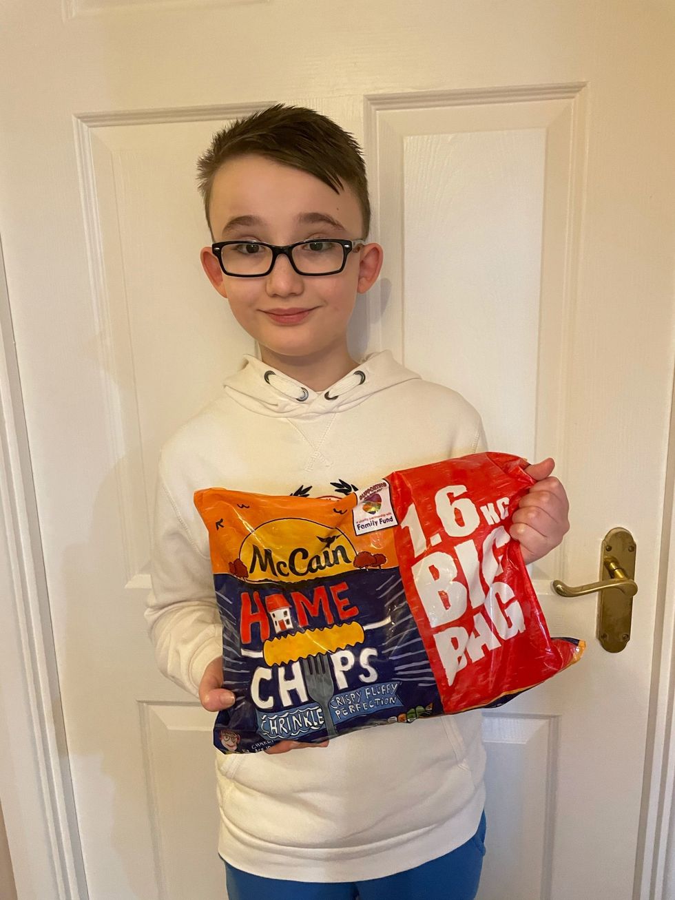 Charlie Conway competition winner with his designed Home Chips packjpeg scaled