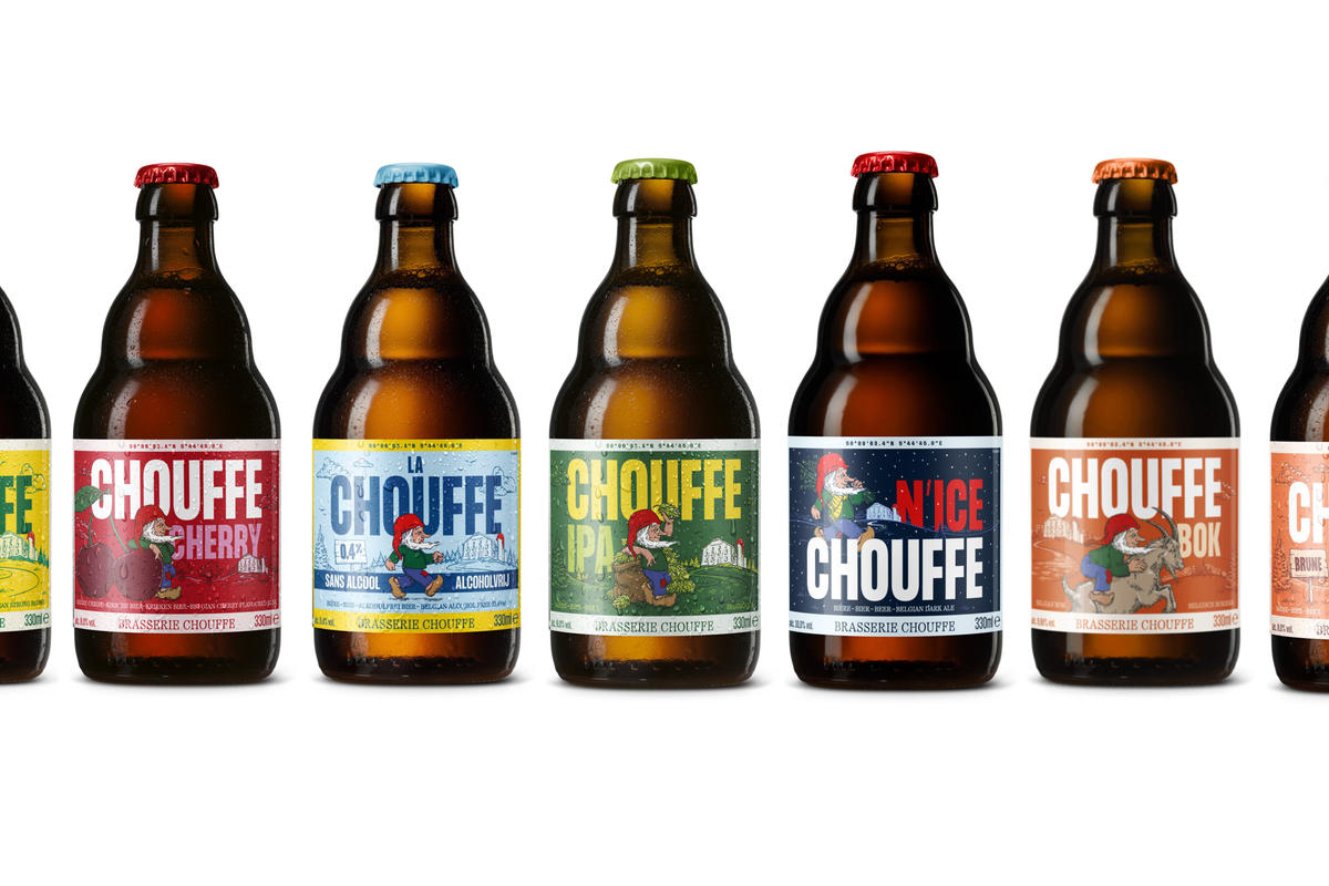 Chouffe beer bottles with new colourful design and iconic gnome mascot in UK retail display
