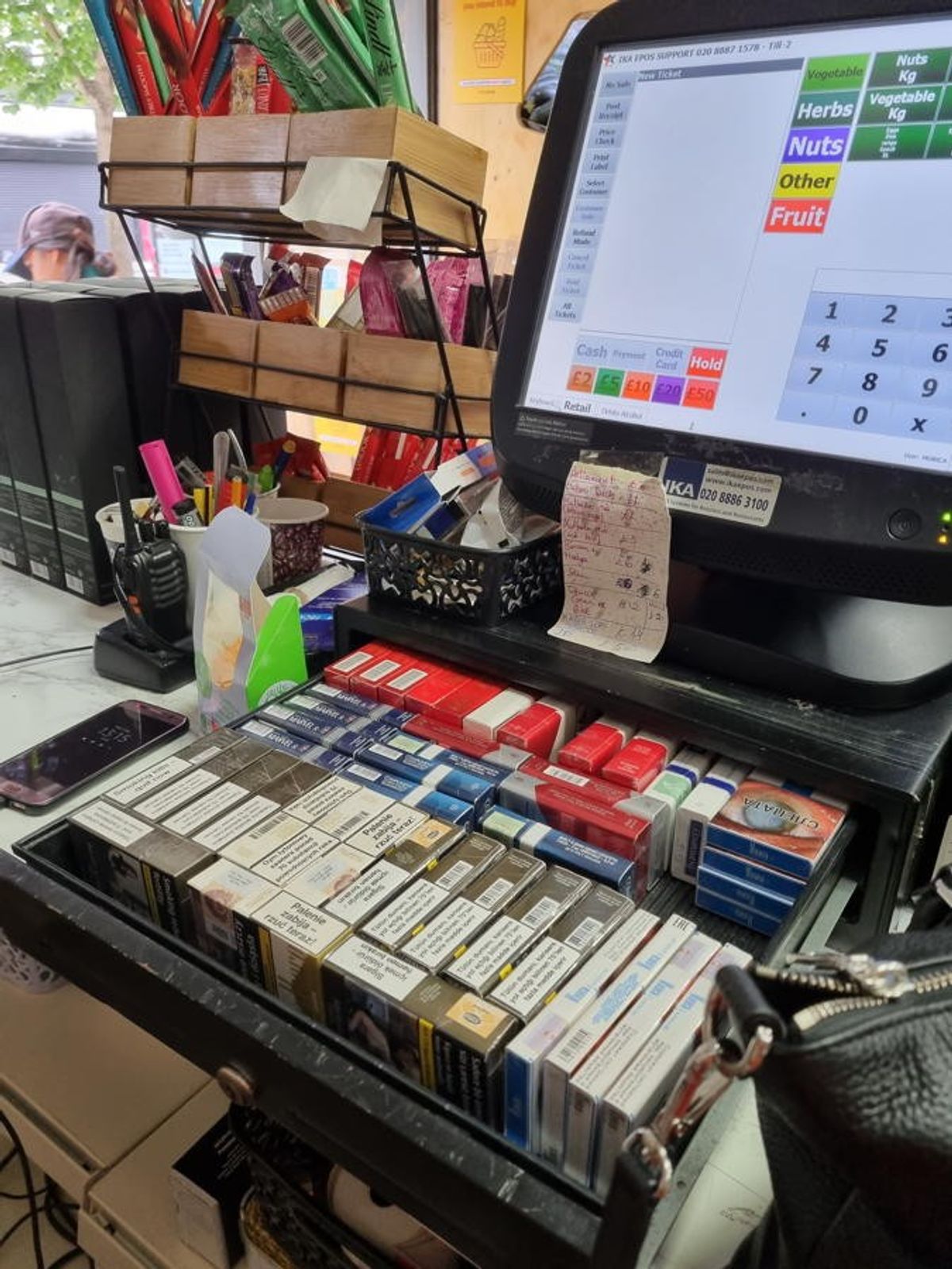 Thousands of illegal cigarettes found hidden in shop till and bread box