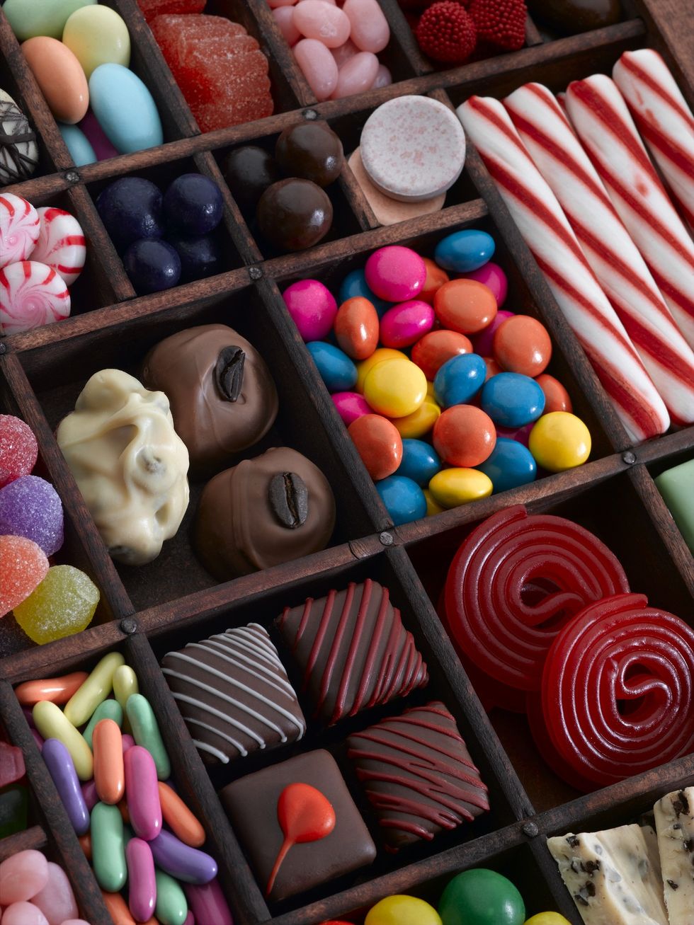 Colorful UK confectionery shelf featuring sharing bags, chocolate, and seasonal treats