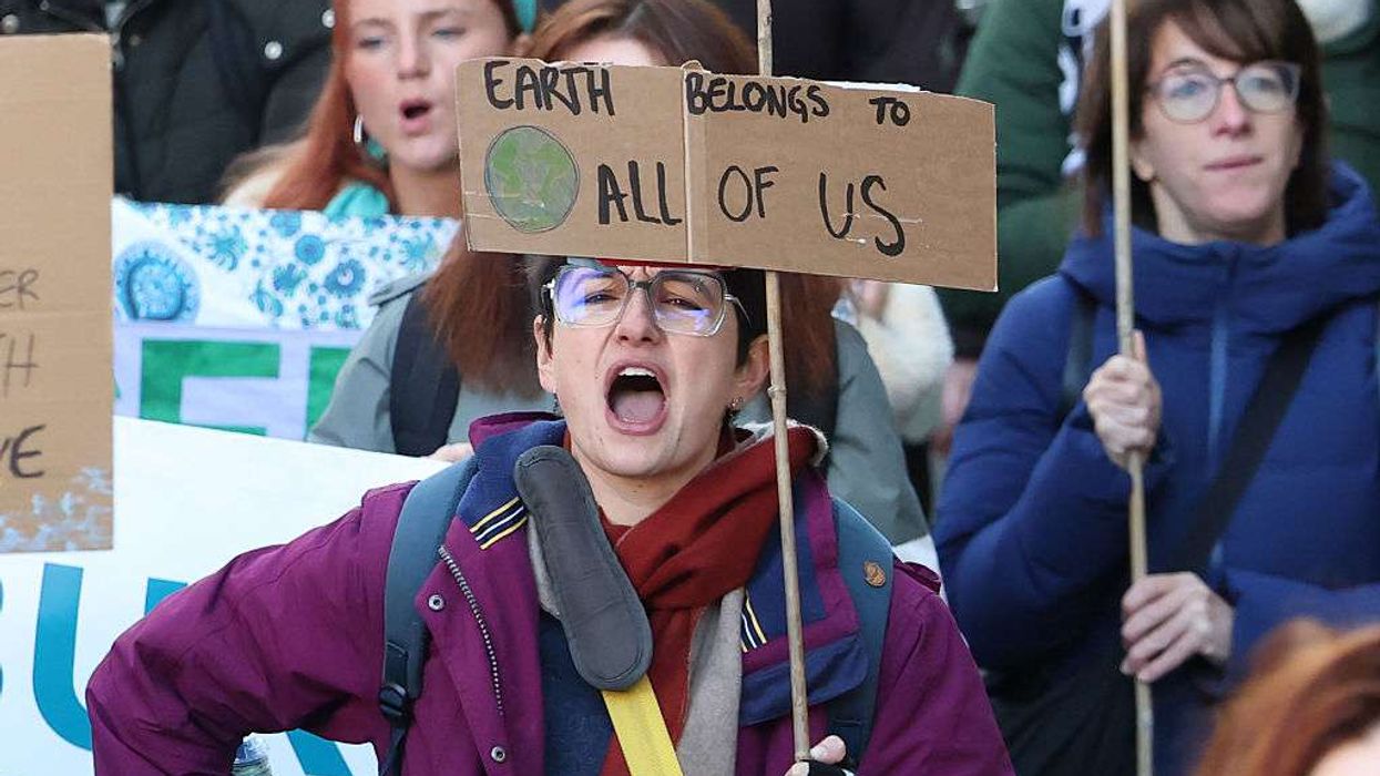 Demonstrators attend a climate protest