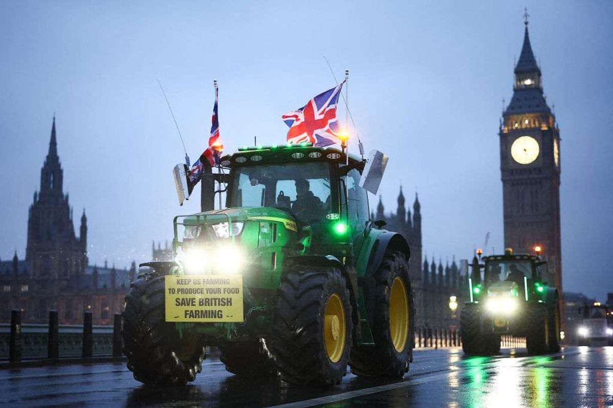 Farmers drive their tractor across Westminster Bridge to protest against changes to inheritance tax rules