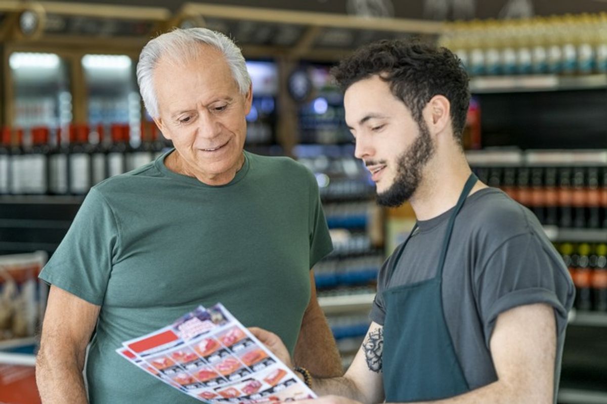 Father’s Day display with chocolate, tools and gifts near checkout in UK store