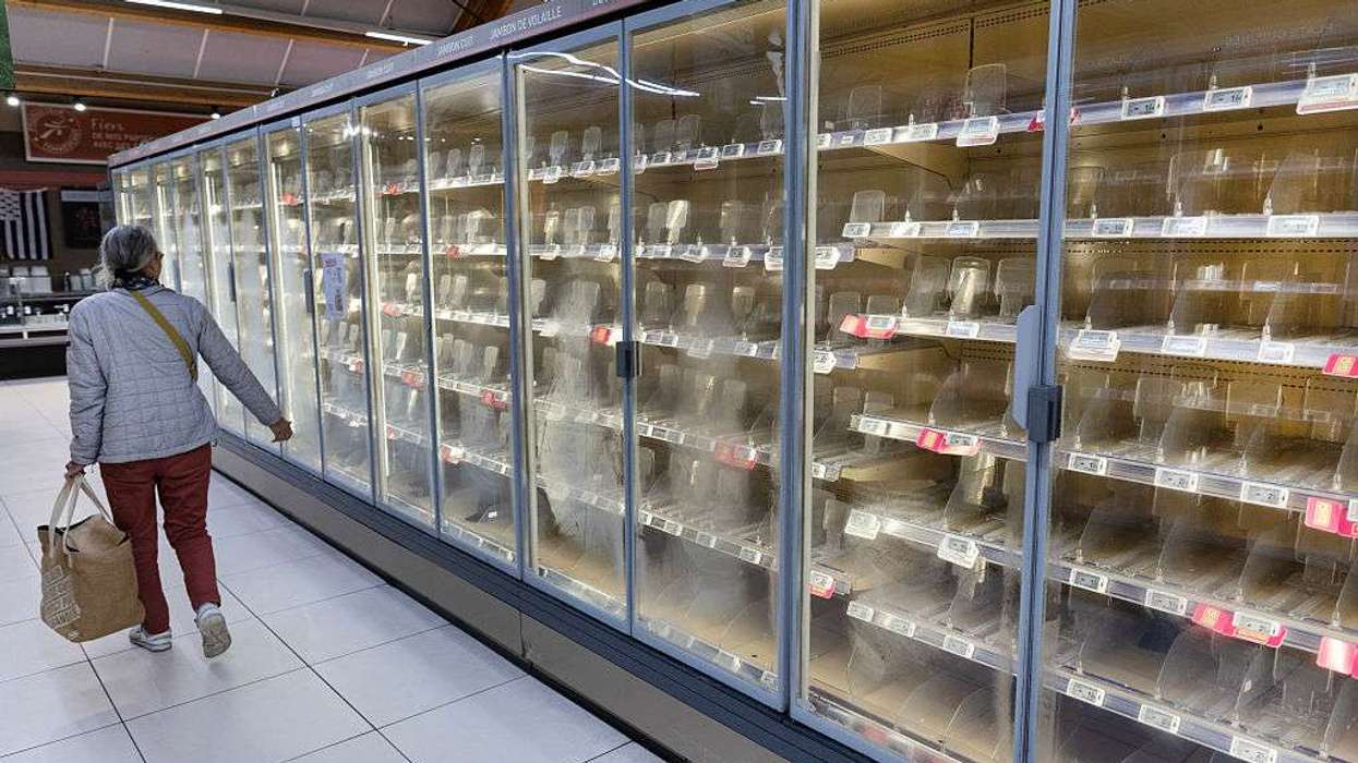 fresh-food refrigerators at a supermarket