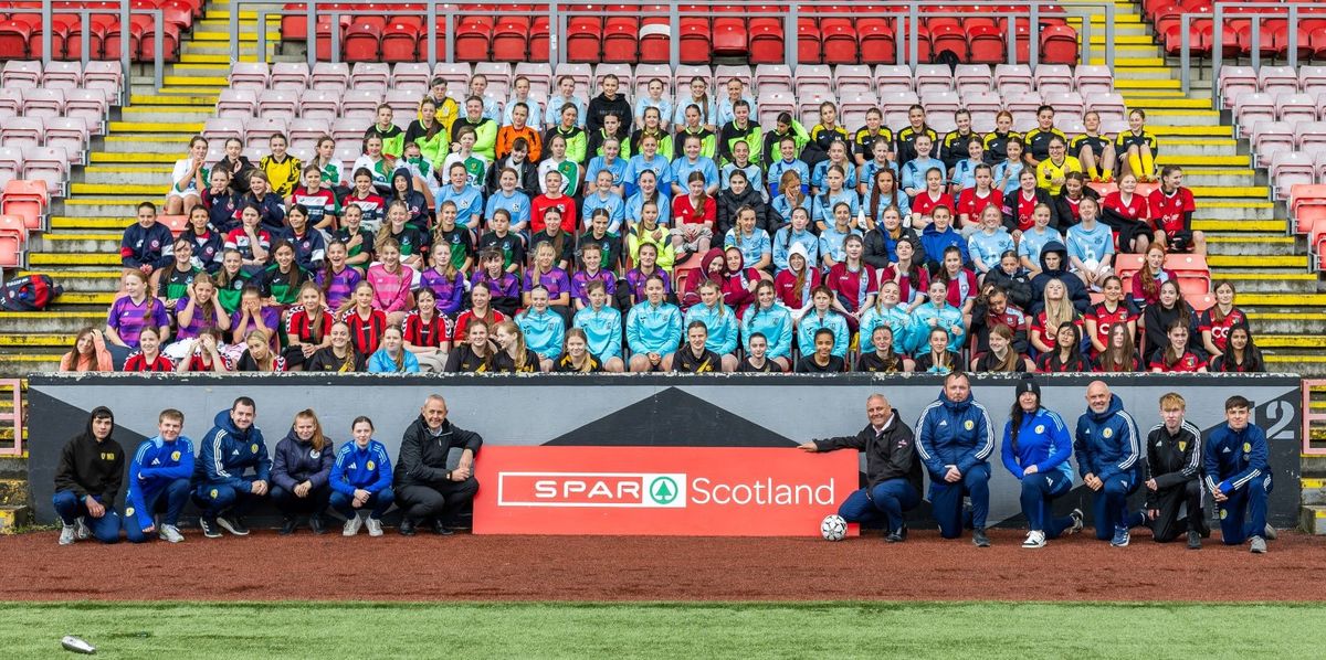 Girls celebrating win at SPAR Future Stars Cup finals at Broadwood Stadium