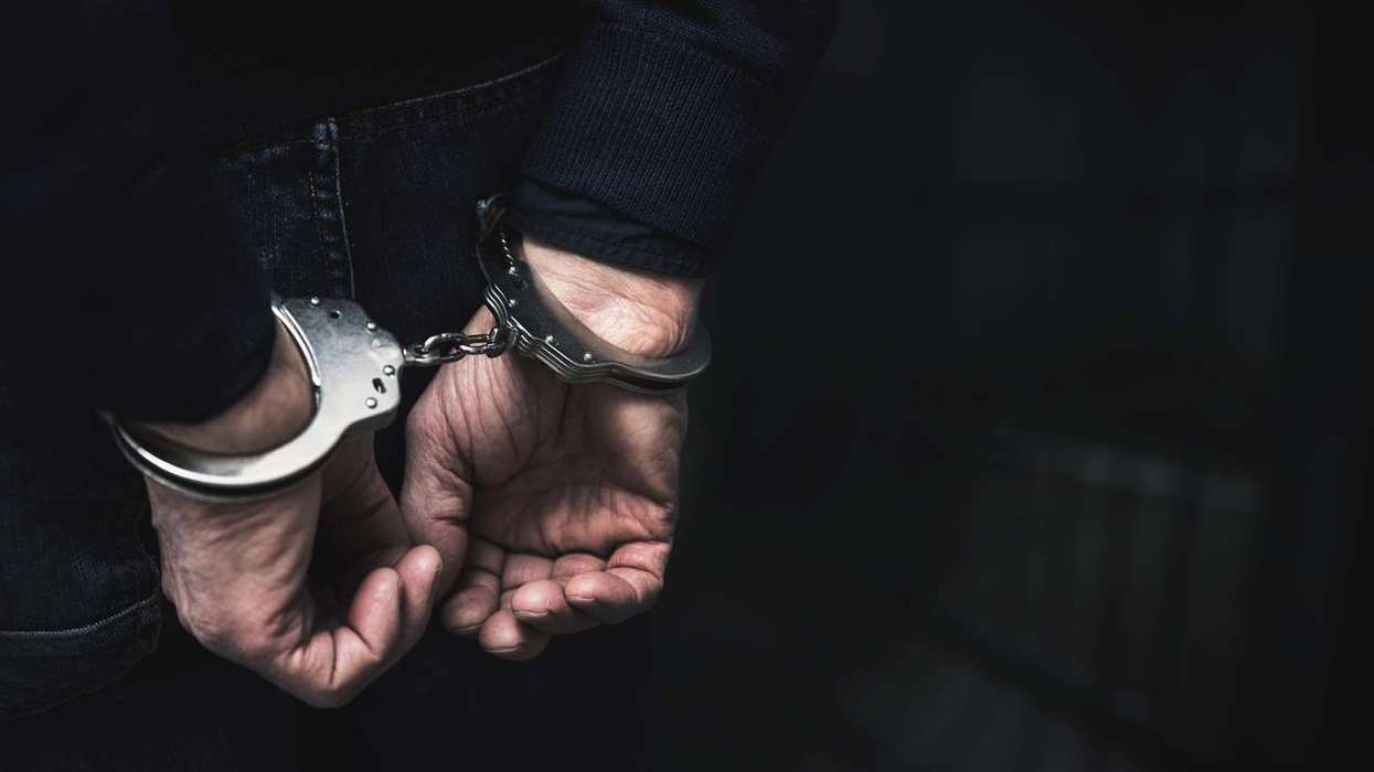 Handcuffed arrested man