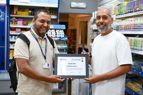  Ikram Vali (L), of Middleton News in Manchester, won the PayPoint All-Rounder award