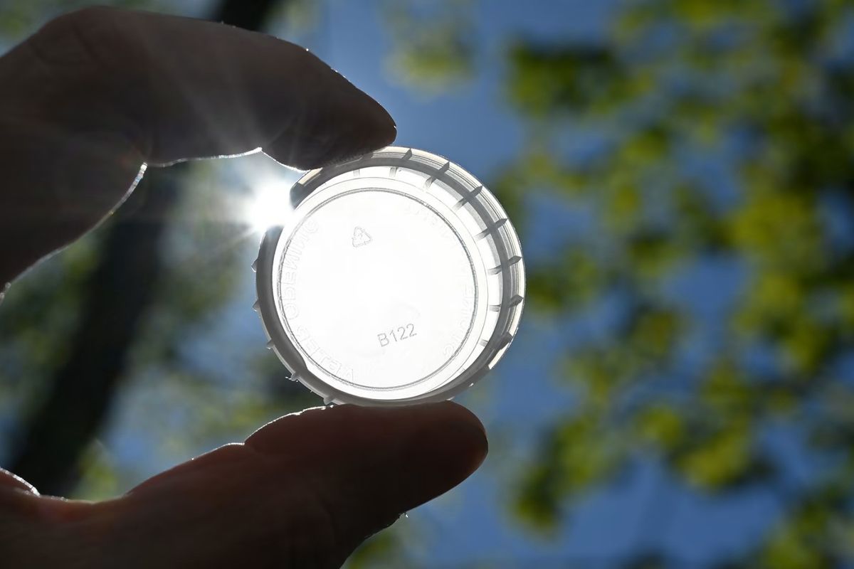 Müller switches to clear milk caps for recycling