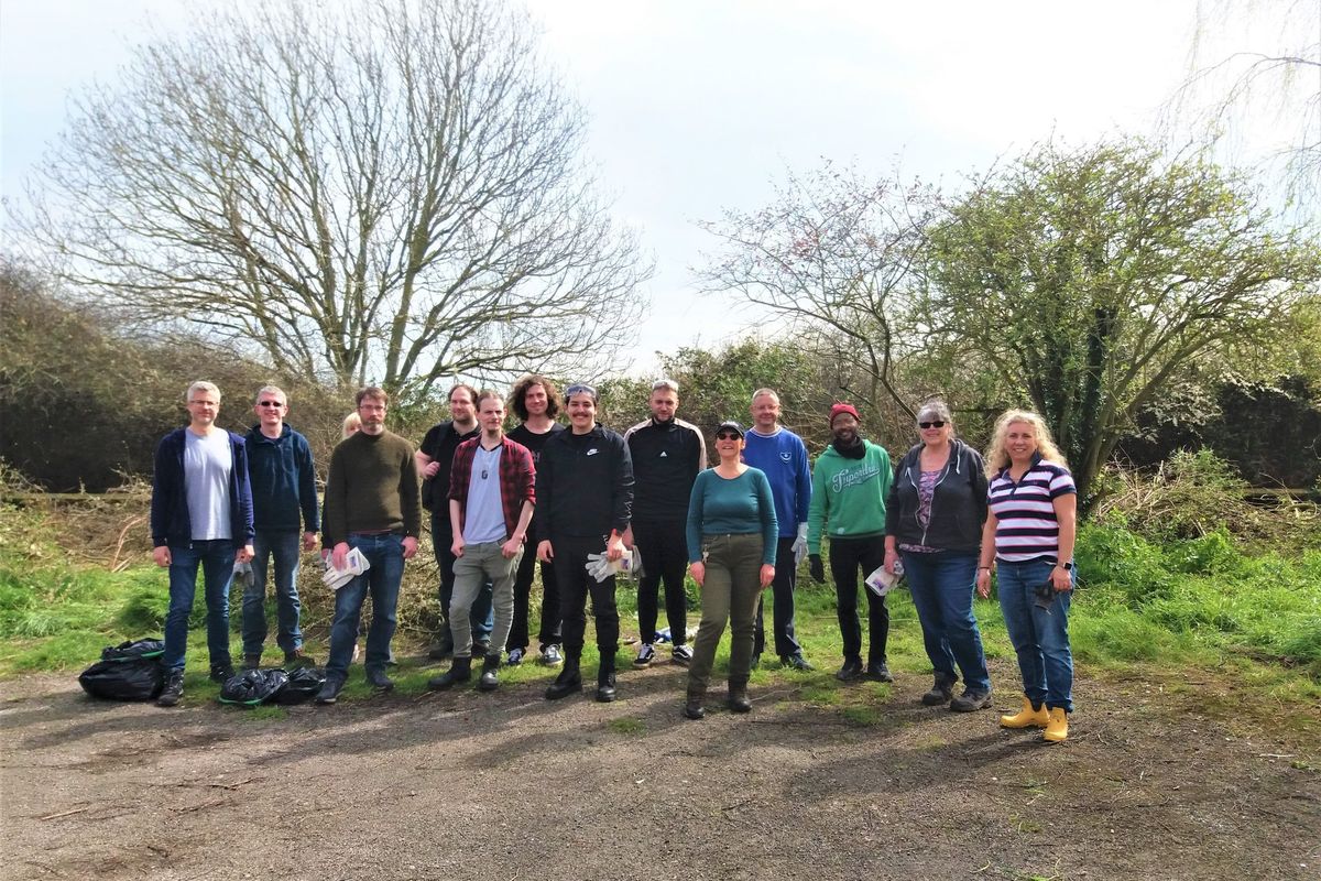 Southern Co-op volunteers help clear green space for preschool