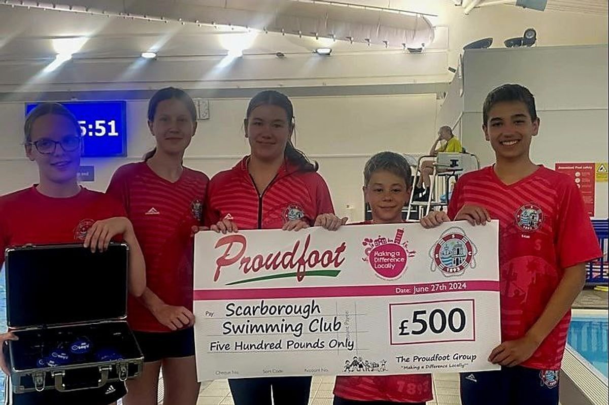 Proudfoot Group makes donation to swimming club through Nisa's charity