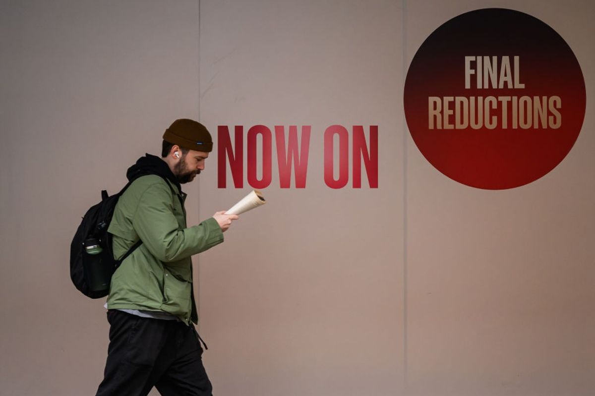 Independent retailer checking business rates bill during April 2025 cost crisis as recommended by Bira