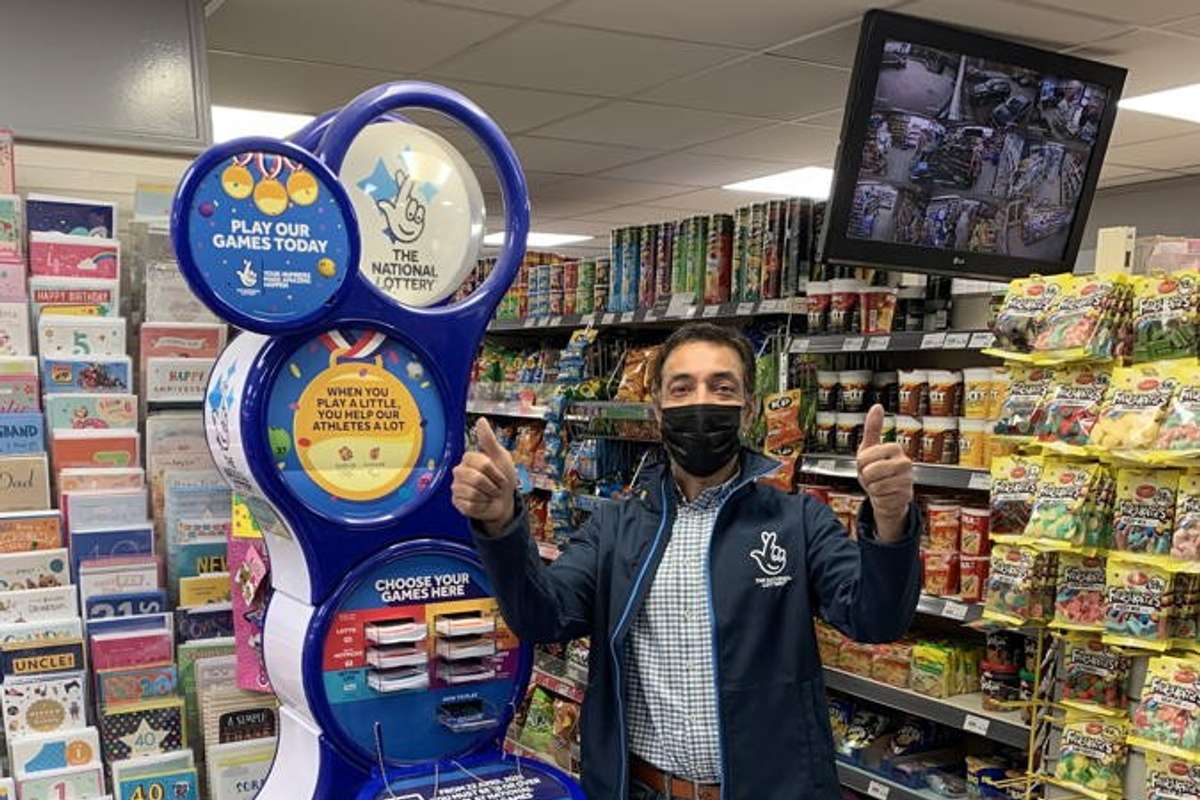 Livingston retailer Javed Iqbal wins £10,000 in Camelot quarterly draw