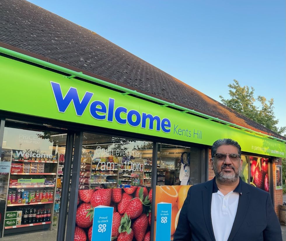 Kash Jaffar in front of his Kents Hill store