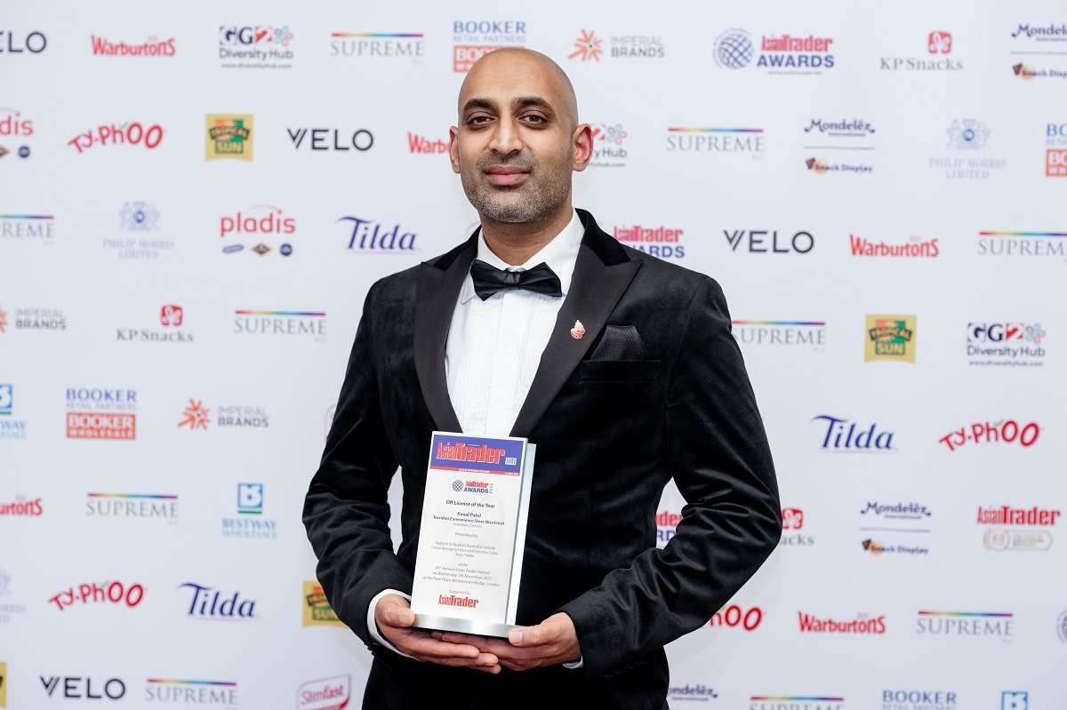 Kaual Patel with the Asian Trader Awards trophy