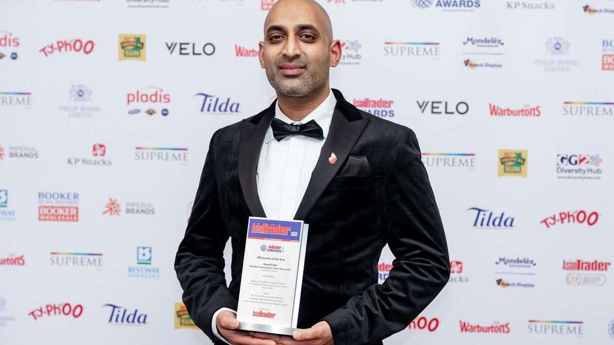 Kaual Patel with the Asian Trader Awards trophy