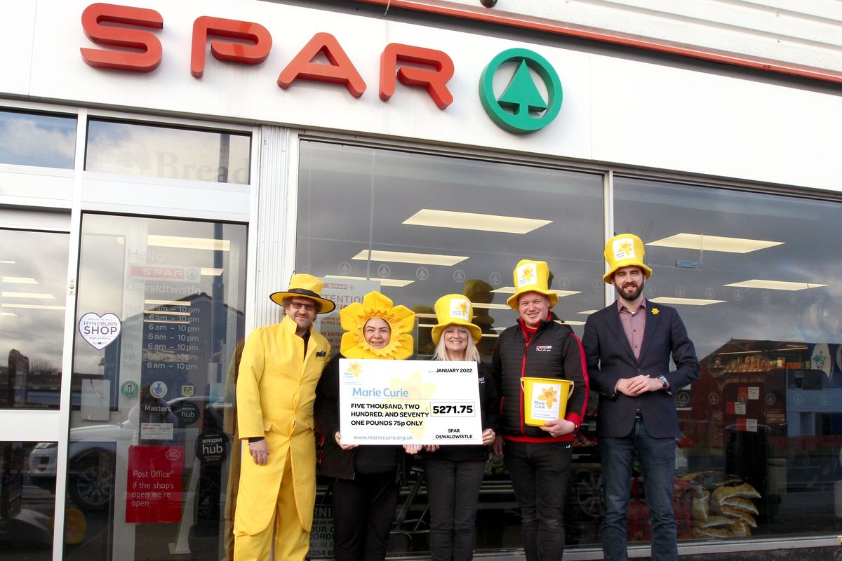 SPAR retailer James Hall marks £500,000 Marie Curie milestone