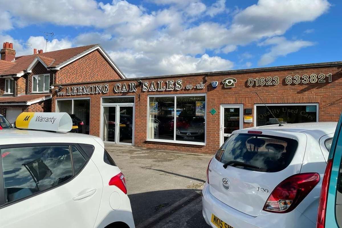 Plan to convert car sales garage into shop refused