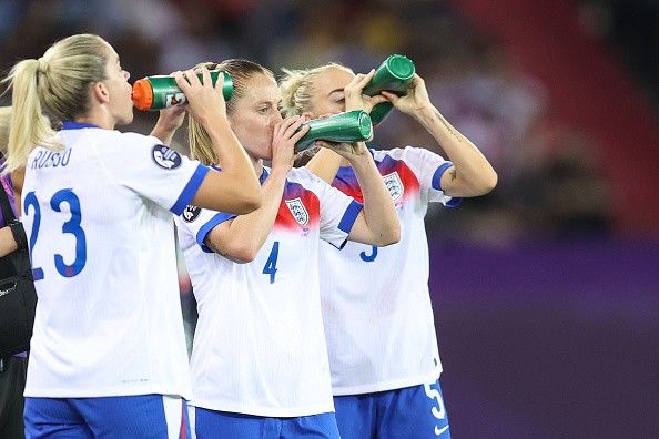Lionesses players rehydrate during Women’s Euros football match