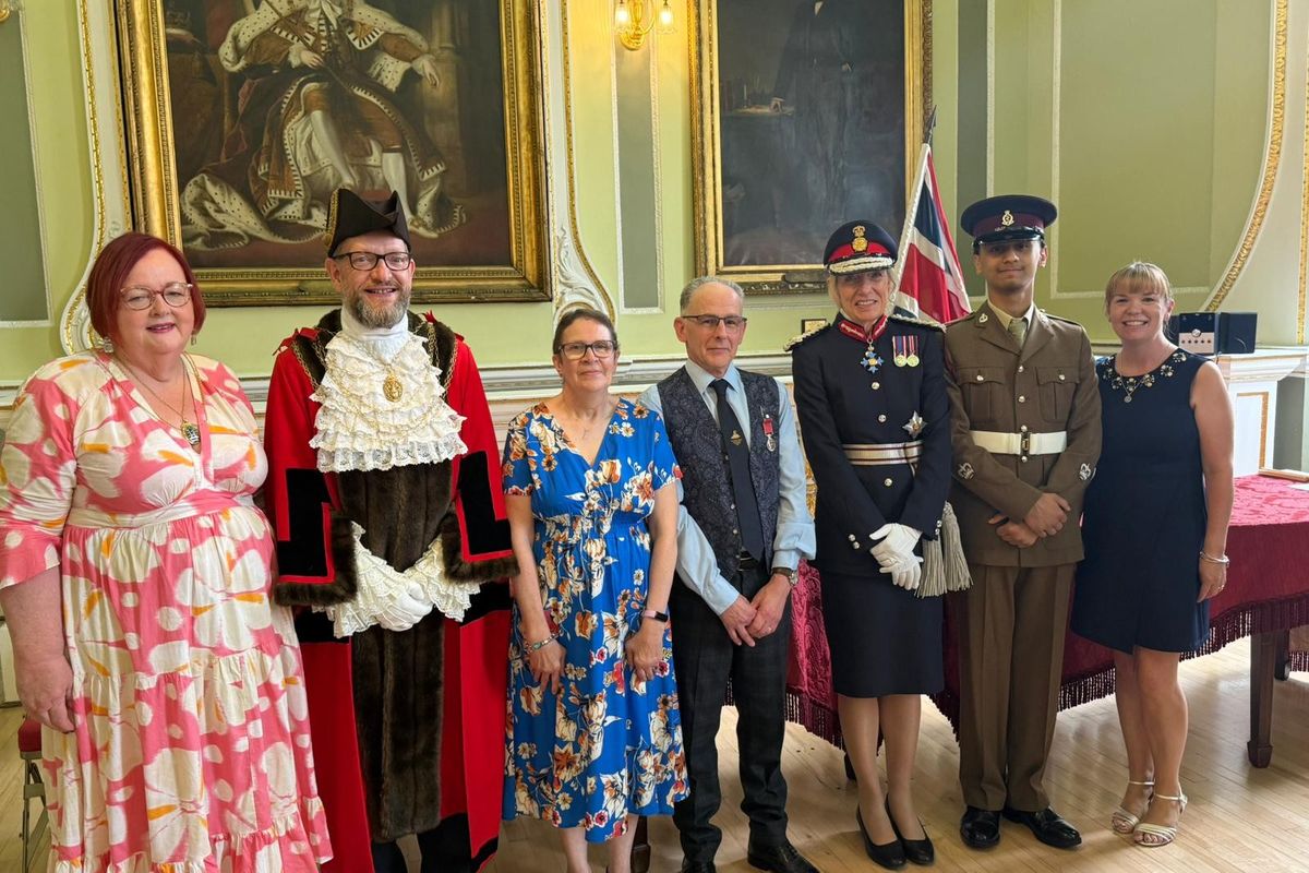 Lord-Lieutenant of South Yorkshire Dame Hilary Chapman, Richard Haley and his wife Steph, with Post Office Area Manager Joanne Fryatt.