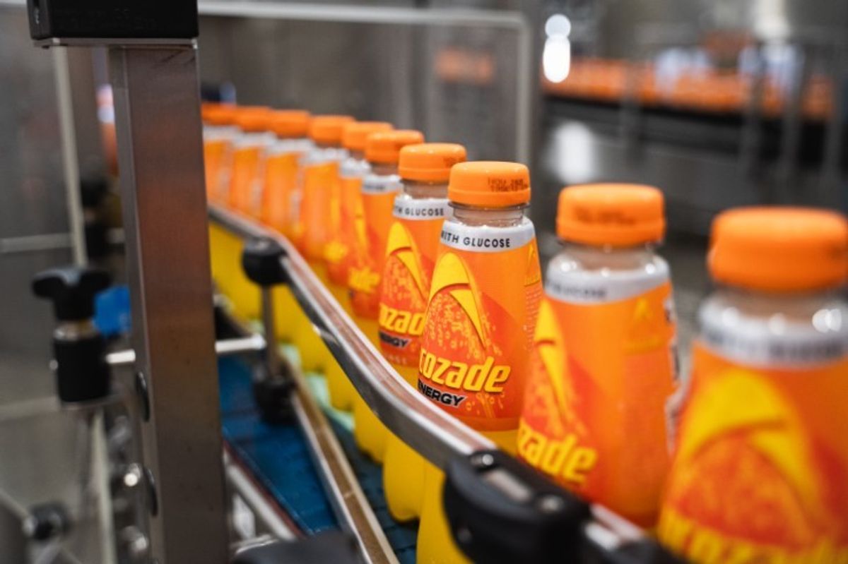Lucozade bottle with half sleeve design cuts plastic use and improves recyclability