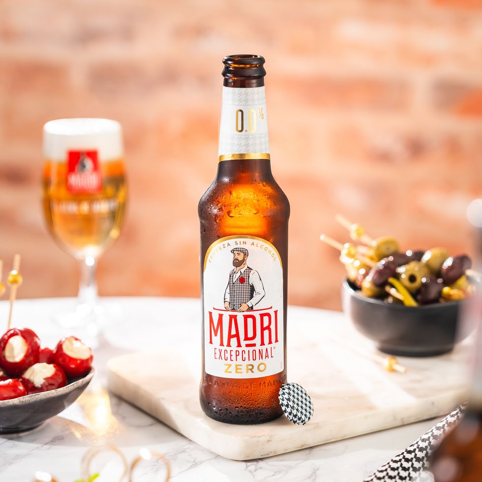 Madr\u00ed Excepcional 0.0% alcohol-free Spanish lager bottle and glass