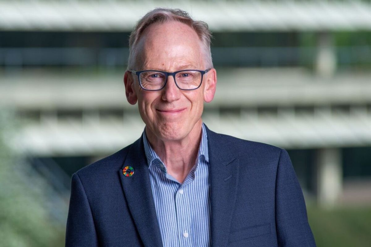 Mark Smith and Ben Stimson, outgoing and incoming CEOs of Southern Co-op, smiling at a leadership handover event in 2025